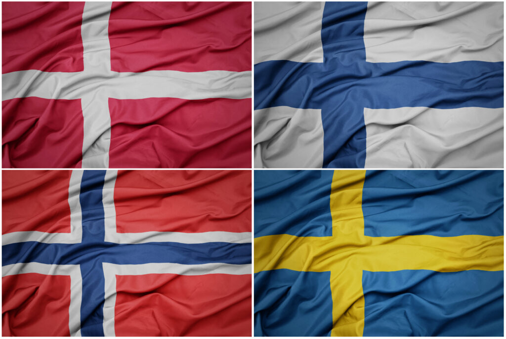 collage of waving colorful national flags of sweden, denmark,finland and norway .